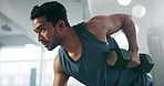 Fitness, dumbbell exercise and a man at gym for body builder training and wellness. Profile of serious Asian person with focus for power, strong muscle and workout for athlete motivation and health