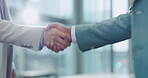 Handshake, thank you and business people meeting for a deal, agreement and collaboration greeting in an office. Corporate, teamwork and employees shaking hands for negotiation of a partnership