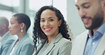 Face, smile and a business woman in a meeting with her colleagues for planning during a workshop. Portrait, audience and female employee in a conference for training or coaching with an employee team
