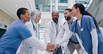 Doctors, hands together and teamwork for healthcare success, applause and hospital motivation in team building. Nurses, medical professional and group of people with stack sign and clapping in clinic