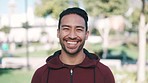 Fitness, happy and face of a male athlete in an outdoor park for race or marathon training workout. Nature, smile and portrait of a young man runner ready for a cardio running exercise in a garden.