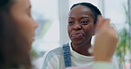 Black woman, talking and eating breakfast in morning with roommate, friend or conversation about yogurt, nutrition or food. Happy, women and friends speaking about day, routine or bonding in home