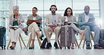 Airport waiting room, travel and business people reading schedule booking, plane flight agenda and patience in lobby. Airplane, luggage suitcase and row of professional group for transport departure