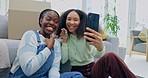 Selfie, new home and happy lesbian couple with keys, smile and excited future investment together. Real estate, love and mortgage, lgbt women relax with moving boxes, phone and sofa in apartment.