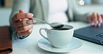 Person, hand and coffee cup in cafe with laptop for remote work, online and customer experience of employee working. Restaurant, table and business woman or writer on computer planning a project