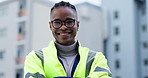 Happy black man, architect and arms crossed in city for professional contracting or building management on site. Portrait of African male contractor or engineer smile on rooftop for architecture