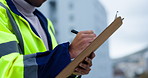??Person, engineering hands and checklist for project management at construction inspection, urban development or city. Manager writing notes on clipboard of outdoor architecture and buildings survey