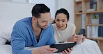 Tablet, couple talk and home with morning and web search with love and care in bedroom. Marriage, website and watching movie online with young people together in a bed with social media app scroll