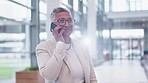 Mature, business deal or happy woman on a phone call talking, networking or speaking of success. Smile, mobile communication chat or female entrepreneur in conversation or negotiation offer in office