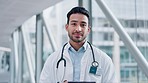 Happy asian man, doctor and tablet in research for medical or healthcare results at the hospital. Portrait of male person or professional smile with technology for Telehealth, online advice or help