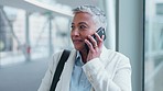Travel communication, airport and woman on a phone call for contact, update or business. Corporate, mature and executive employee or manager speaking on a mobile during a trip for work or discussion