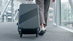 Business, travel and feet walking in airport with luggage for journey to convention, conference or employee on work trip for seminar. Moving, suitcase and shoes on floor in flight terminal or lobby