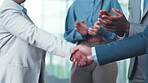 Handshake, applause and business people celebrate partnership, success or office collaboration. Teamwork, congratulations and thank you for clapping or shaking hands at corporate meeting or agreement