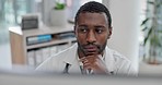 Doctor, man and reading medical research in office thinking in hospital or healthcare clinic. African male professional, working and computer for email and information online for health and care work
