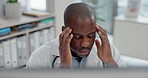 Healthcare, headache and computer with a doctor black man in a hospital, working on a negative report for diagnosis. Medical, anxiety or stress with a medicine professional looking tired in a clinic