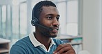 Call center, telemarketing and black man in office consulting for customer service, crm or contact us. Smile, advice and friendly male lead generation consultant, service or b2b virtual assistance