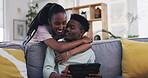 Tablet, hug or happy black couple online shopping on internet connection for ecommerce at home. Love, search or woman speaking to an African man streaming on subscription service to relax together