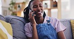 Phone call, funny and black woman on sofa in home living room, talking and communication. Smartphone, laughing and African person on couch, happy and conversation, comedy chat and discussion of joke