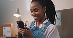 Video call, phone and young woman moving to her new apartment, property or home with boxes. Technology, virtual chat and African female person on a mobile conversation with cellphone at her house.