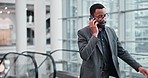 Business, phone call and black man with connection, communication and network in a workplace. African person, employee and consultant with a smartphone, conversation and discussion for information 