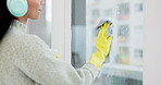 Headphone, window and woman spray cleaning a glass door in home living room as for hygiene, protection or disinfection. Dirt, dust and person or cleaner doing domestic or sanitary housekeeping work