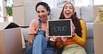 Happy, chalkboard and gay couple winking in their new home together for growth or investment in property. Portrait, smile or moving house with a lesbian woman and lgbt partner in the living room