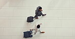 Airport luggage, top view business people and walking to plane boarding, travel holiday or international opportunity. Hotel lobby floor, flight schedule and corporate team journey to airplane booking