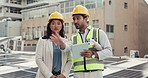 People, architect and tablet on rooftop in solar panel installation, inspection or building maintenance in city. Man and woman or engineering team with technology in meeting or planning construction