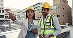 People, architect and tablet pointing on rooftop in planning, building inspection or construction together on site. Man and woman or engineering team with technology in project or city architecture