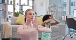 Yoga, meditation and women in home together, fitness and mindfulness training in living room. Balance, breathing and workout, friends in holistic exercise in peace and zen for health in apartment.