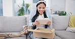 Woman, open box and excited for delivery, purse or e commerce with surprise, gift and cardboard package. Girl, present and distribution with stock, fashion and happy for product in home living room