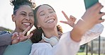 Fitness, selfie and girl friends in a park for a wellness, health and body workout together. Happy, smile and young female athletes taking a picture with peace sign after outdoor exercise or training