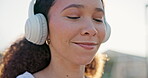 Summer, happy and a woman with music and a phone for social media, communication and the radio. Smile, face and a girl or person with headphones or a podcast, audio or a mobile for a streaming app