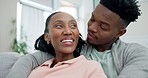 Home, hug and black couple with marriage, smile and bonding with relationship, affection and romantic in a living room. Romance, man or woman embrace, support and care with peace and loving together