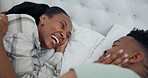 Happy, care and a black couple on a bed for conversation, love and communication. Relax, comfort and an African woman with a man in a home bedroom for talking, bonding and together in the morning