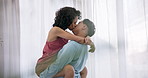 Love, carry and lesbian couple kiss, homosexual women hug or queer girlfriend bond, desire and intimate in Colombia home. LGBT, embrace and transgender people with marriage partner in honeymoon hotel