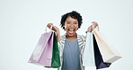 Face, woman and excited for retail shopping bag, sales choice or financial freedom on white background. Portrait of happy customer celebrate winning gift, present and shout for fashion deal in studio