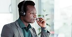 Customer service, sales and black man listening, consulting and advice at telemarketing help desk. Phone call, conversation and advisory callcenter consultant with headset, support and talk in office