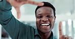 Face, smile and finger frame with a business black man in the office closeup for a photograph. Portrait, happy and measure with a young employee looking excited in his professional workplace