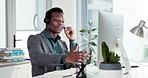 Customer service, telemarketing and happy black man at computer, consulting and advice at help desk. Phone call, conversation and smile, callcenter consultant with headset, info and talk in office.