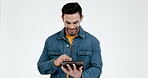 Man, happy and tablet for social media in studio on white background, ebook and search website for movie and meme. Phone, smile and Indian person with digital touch for internet and scroll 