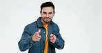 Happy, finger gun and man on a white background pointing with trendy clothes, style and outfit. Fashion, relax and portrait of isolated confident person with hand gesture, symbol and emoji in studio