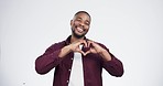 Heart, hands and face of black man in studio for support, hope or motivation on white background. Love, icon and portrait of happy model with emoji frame for thank you, kindness or vote gratitude
