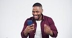 Prize, celebration and black man winning on a phone with giveaway isolated in a studio white background. Wow, winner and young person happy or excited for bonus online from mobile app or internet
