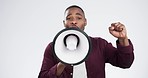 Black man, megaphone and protest speech in studio, shouting or fist for power, face or freedom by white background. African guy, bullhorn or audio tech for justice, noise or activism for human rights