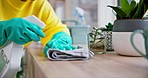 Cleaner, hands and person with chemical, cleaning furniture and spray with hygiene and gloves, disinfection and product. Hospitality, housekeeping and service with janitor, house work and detergent