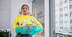 Cleaner, face and woman with basket of chemical cleaning supplies, hygiene and gloves, disinfection and product. Hospitality, housekeeping and portrait, service and janitor, house work and detergent