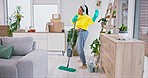 Woman, singing and mop on living room floor for dirt, service or hospitality in gloves, safety or bacteria in home. Maid lady, cleaning and headphones for music, dust or shine with comic housekeeping