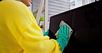 Hands, computer and cleaning screen for dust, wellness or bacteria hygiene routine in home office. Person, fabric and cloth for desktop technology disinfection, dirt and virus safety in house service