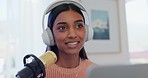 Microphone, headphones and woman on podcast, live stream and journalist with connection, talk show and speaking. Home, influencer and content creator with headset, technology and media broadcast